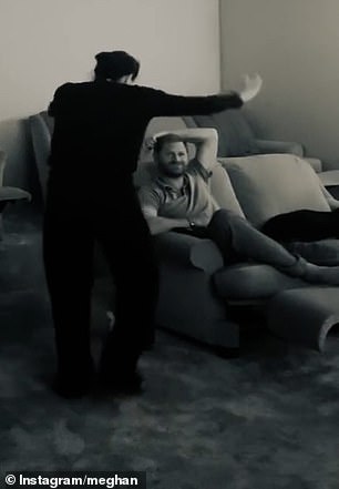 Jumping and screaming for joy alongside her best friend Kelly McKee Zajfen, the mother-of-two rushed to share a kiss with her husband, Prince Harry , who looked unimpressed after his team failed to win (pictured)