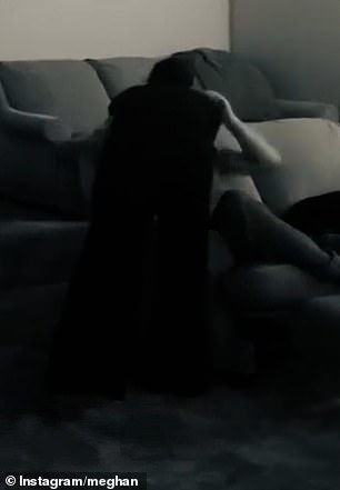 Jumping and screaming for joy alongside her best friend Kelly McKee Zajfen, the mother-of-two rushed to share a kiss with her husband, Prince Harry , who looked unimpressed after his team failed to win (pictured)