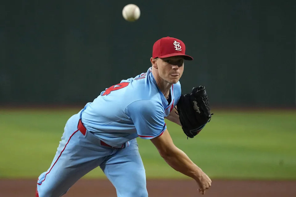 St. Louis Cardinals pitcher Sonny Gray (54) throws against the Arizona Diamondbacks in the first inning at Chase Field. Rick Scuteri-Imagn Images