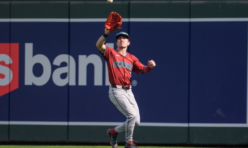 Sep 14, 2025; Minneapolis, Minnesota, USA; Arizona Diamondbacks right fielder Corbin Carroll (7) catches a fly ball hit by Minnesota Twins first base Kody Clemens (18) in the eighth inning at Target Field. Mandatory Credit: Matt Blewett-Imagn Images