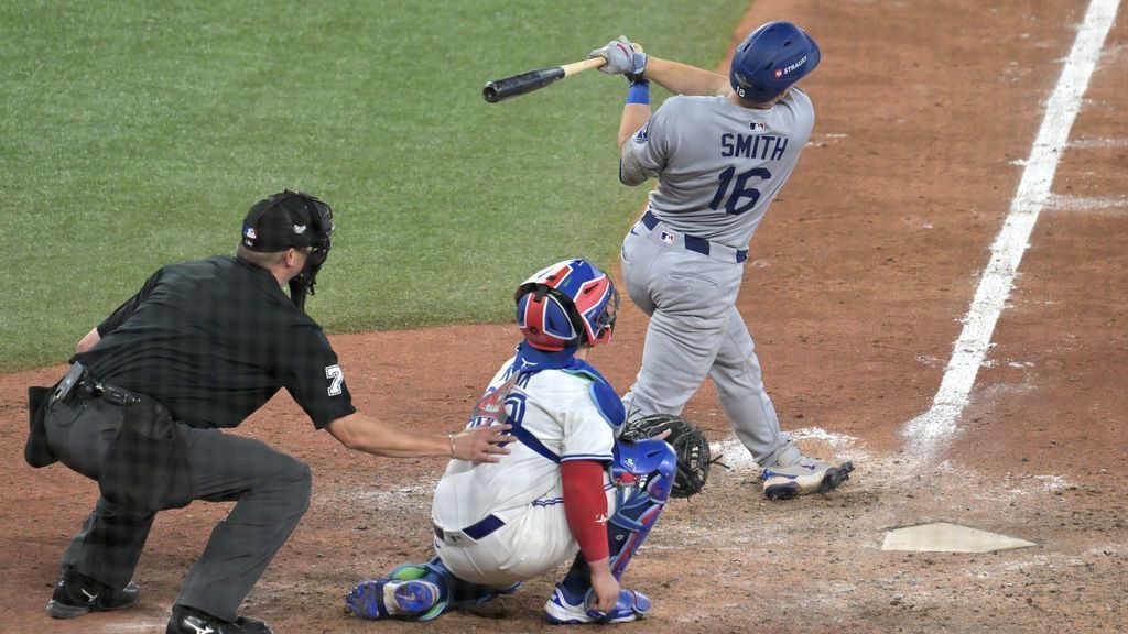 Auction house collects World Series HR balls from father, son