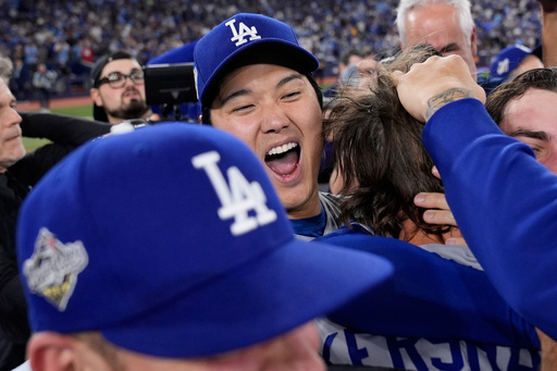 Los Angeles Dodgers pitcher Shohei Ohtani celebrates after their win against the Toronto Blue Jays in Game 7 of baseball
