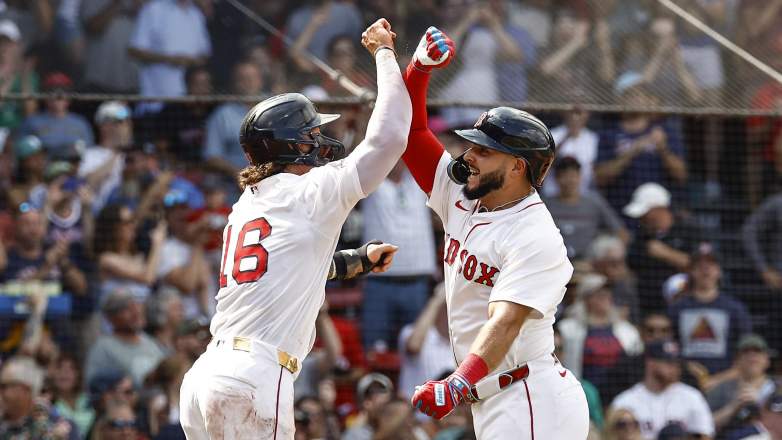 BOSTON, MA - AUGUST 17: Wilyer Abreu #52 of the Boston Red Sox is congratulated by Jarren Duran #16 after Abreu hit a two-run home run against the Miami Marlins during the fourth inning at Fenway Park on August 17, 2025 in Boston, Massachusetts. (Photo By Winslow Townson/Getty Images)