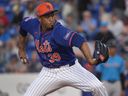New York Mets pitcher Edwin Diaz throws during the fifth inning of a spring training game against the Miami Marlins.