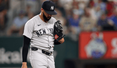 Yankees pitcher Devin Williams reacts after blowing a save against the Rangers as manager Aaron Boone looks on during a rough August 2025 series.