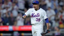 Jul 3, 2025; New York City, New York, USA; New York Mets relief pitcher Edwin Diaz (39) celebrates after defeating the Milwaukee Brewers at Citi Field. Mandatory Credit: Brad Penner-Imagn Images