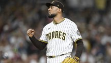 Sep 27, 2025; San Diego, California, USA; San Diego Padres relief pitcher Robert Suarez (75) pumps his fist after the Padres beat the Arizona Diamondbacks at Petco Park. Mandatory Credit: Denis Poroy-Imagn Images