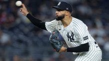 Sep 25, 2025; Bronx, New York, USA; New York Yankees relief pitcher Devin Williams (38) pitches against the Chicago White Sox during the eighth inning at Yankee Stadium. Mandatory Credit: Brad Penner-Imagn Images