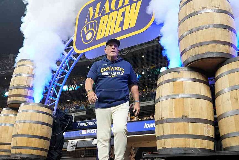 Milwaukee Brewers manager Pat Murphy arrives for Game 1 of baseball's National League Championship Series between the Milwaukee Brewers and the Los Angeles Dodgers on Monday, Oct. 13, 2025, in Milwaukee. (AP Photo/Brynn Anderson)
