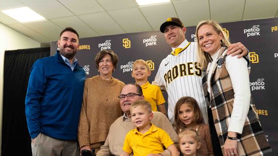 Craig Stammen poses with his family as he is introduced as the new Padres manager, Monday November 10, 2025 in San Diego, Calif.