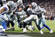 Dallas Cowboys defensive end Donovan Ezeiruaku (41) tackles Las Vegas Raiders running back...