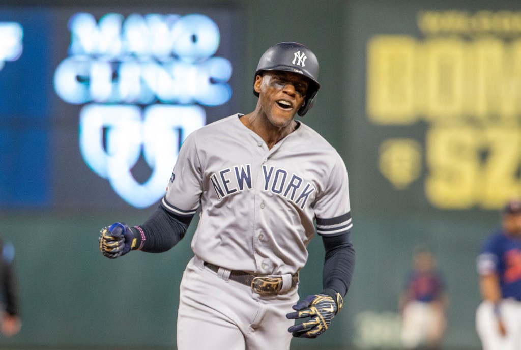 Cameron Maybin #38 of the New York Yankees hits a home run.