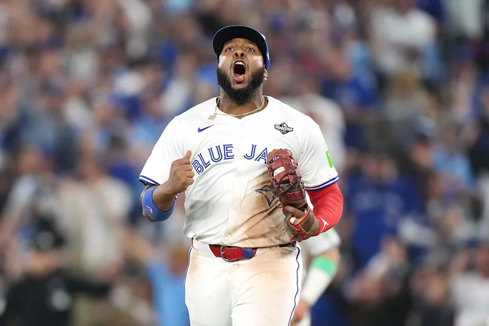 Toronto Blue Jays first baseman Vladimir Guerrero Jr. (27) reacts after an inning-ending double play during seventh inning Game 7 World Series playoff MLB baseball action against the Los Angeles Dodgers in Toronto on Saturday, Nov. 1, 2025. THE CANADIAN PRESS/Nathan Denette