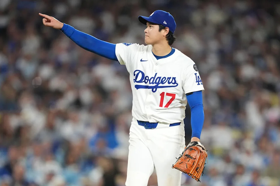 Los Angeles Dodgers two-way player Shohei Ohtani looks on during an MLB gameKirby Lee-Imagn Images