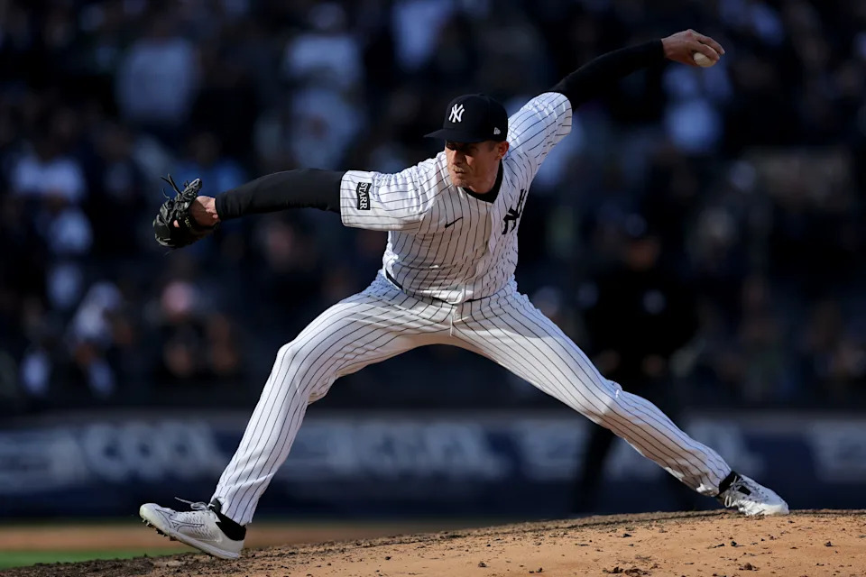 Mar 27, 2025; Bronx, New York, USA; New York Yankees relief pitcher Tim Hill (41) pitches against the Milwaukee Brewers during the sixth inning at Yankee Stadium. Mandatory Credit: Brad Penner-Imagn Images