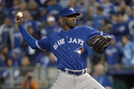 Oct 16, 2015; Kansas City, MO, USA; Toronto Blue Jays relief pitcher LaTroy Hawkins (32) throw against the Kansas City Royals during the eighth inning in game one of the ALCS at Kauffman Stadium. Mandatory Credit: Denny Medley-Imagn Images