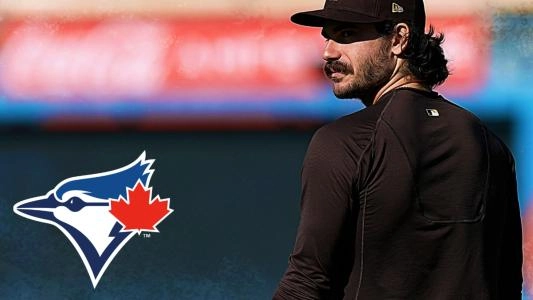 San Diego Padres starting pitcher Dylan Cease and Blue Jays logo