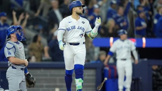 Nov 1, 2025; Toronto, Ontario, CAN; Toronto Blue Jays designated hitter Bo Bichette (11) reacts after hitting a three run home run against the Los Angeles Dodgers in the third inning during game seven of the 2025 MLB World Series at Rogers Centre. Mandatory Credit: John E. Sokolowski-Imagn Images