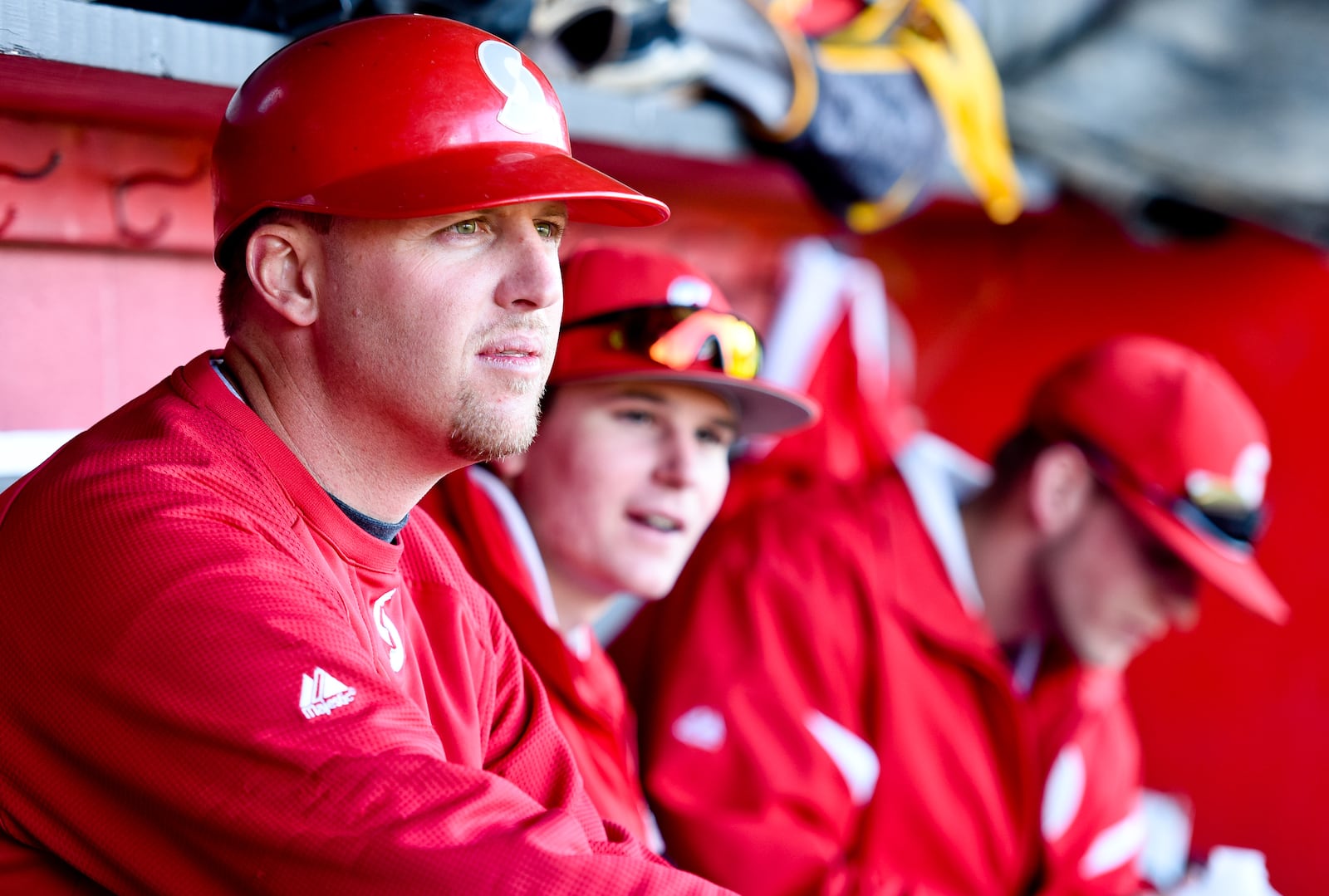 Sinclair baseball coach Steve Dintaman watches his team from the dugout during their game against Miami Hamilton Thursday, April 23, 2015, at Foundation Field in Hamilton. NICK GRAHAM/STAFF