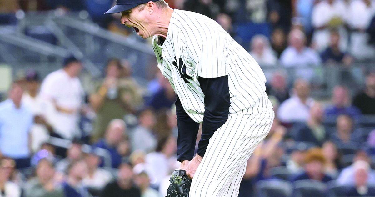 Yankees pick up option on lefty pitcher Hill |