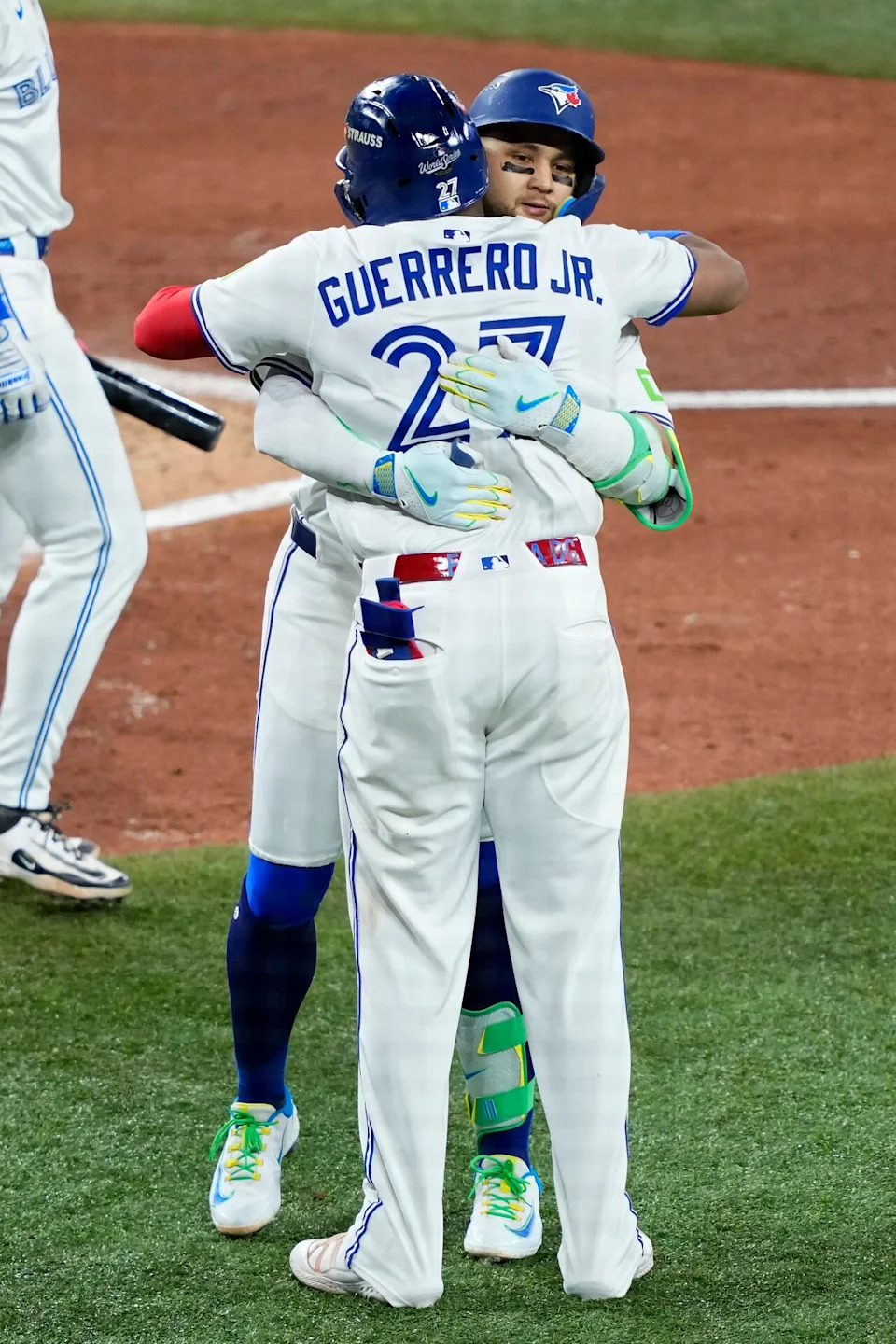 Bo Bichette of the Toronto Blue Jays celebrates his three-run home run with Vladimir Guerrero Jr. against the Los Angeles Dodgers during the third inning in Game 7 of the 2025 World Series at Rogers Center on Nov. 1, 2025 in Toronto.