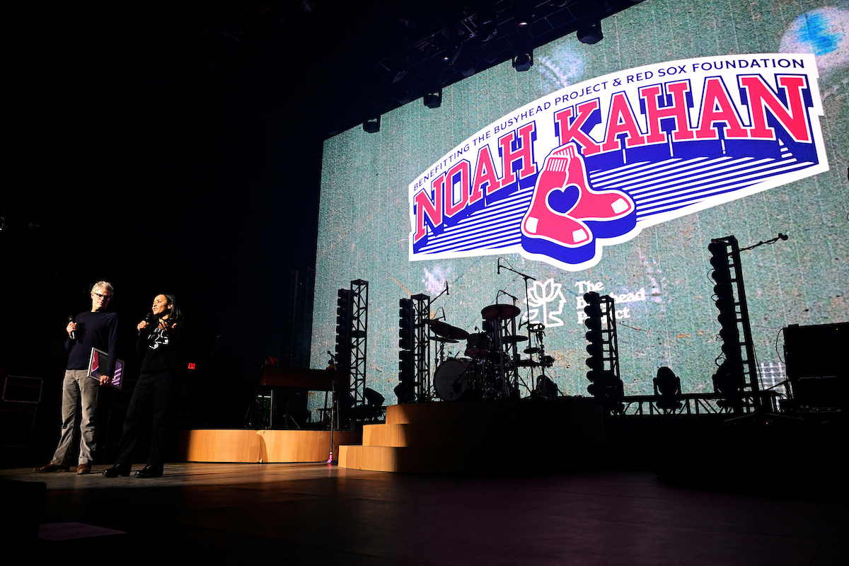 November 20, 2025, Boston, MA: Jeb Gutelius of the Busyhead Project and Red Sox Executive Vice President of Social impact and Red Sox Foundation Executive Director Rebekah Salwasser speak ahead of during a Noah Kahan benefit concert for the Busyhead Project and Red Sox Foundation at MGM Music Hall in Boston, Massachusetts Thursday, November 20, 2025.  
(Photo by Rachel O’Driscoll/Boston Red Sox)