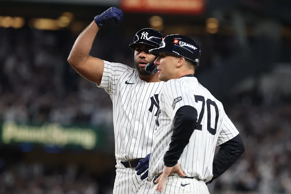 Oct 2, 2025; Bronx, New York, USA; New York Yankees third baseman Amed Rosario (14) reacts at first base after hitting an RBI single in the fourth inning against the Boston Red Sox during game three of the Wildcard round for the 2025 MLB playoffs at Yankee Stadium. Mandatory Credit: Vincent Carchietta-Imagn Images
