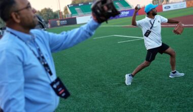 Cincinnati Reds great Barry Larkin brings baseball to the Middle East, with camels carting in relief pitchers from the bullpen