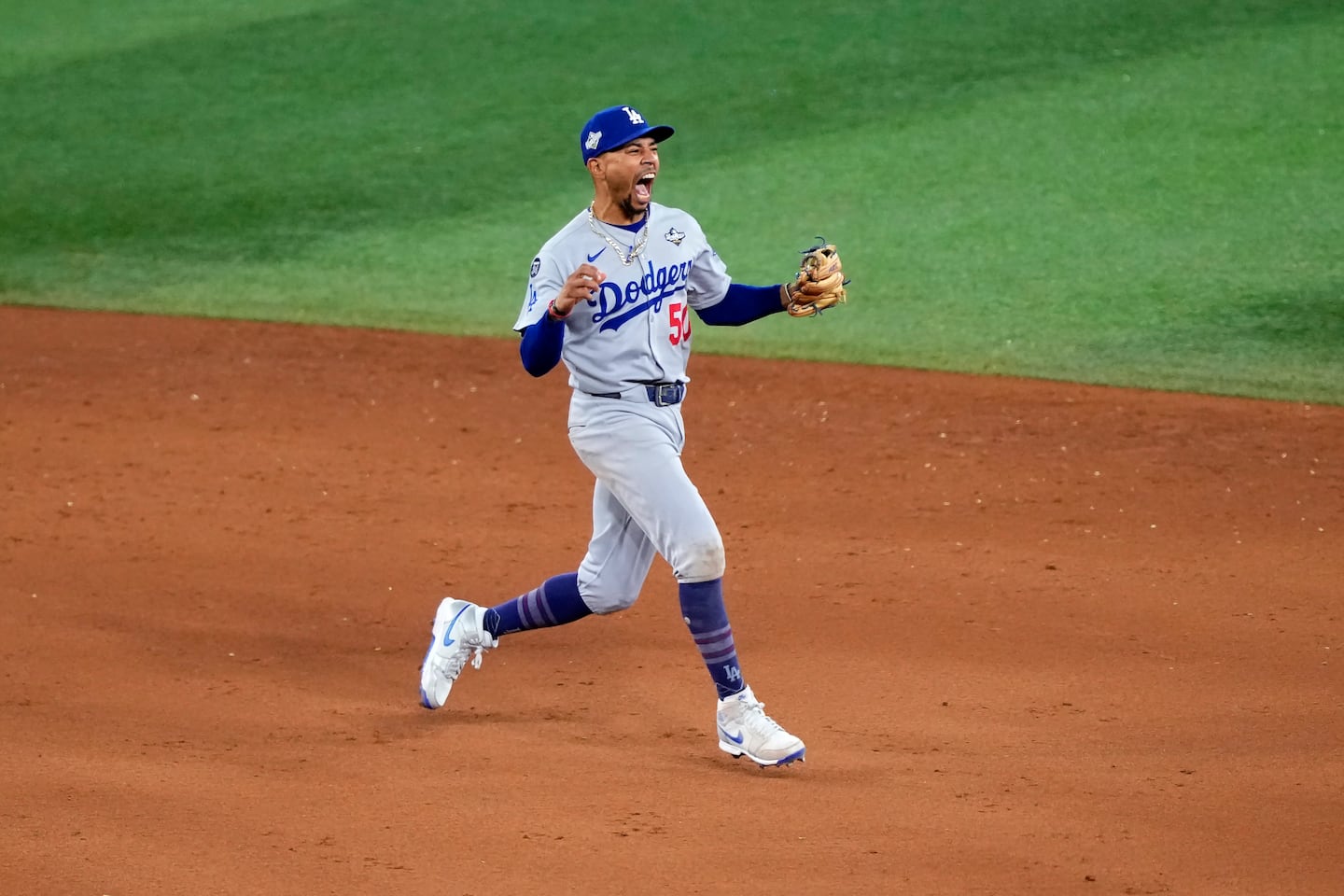 Mookie Betts #50 of the Los Angeles Dodgers celebrates after turning a double play to defeat the Toronto Blue Jays 5-4 in Game 7 of the 2025 World Series at Rogers Centre on November 02 in Toronto, Ontario.