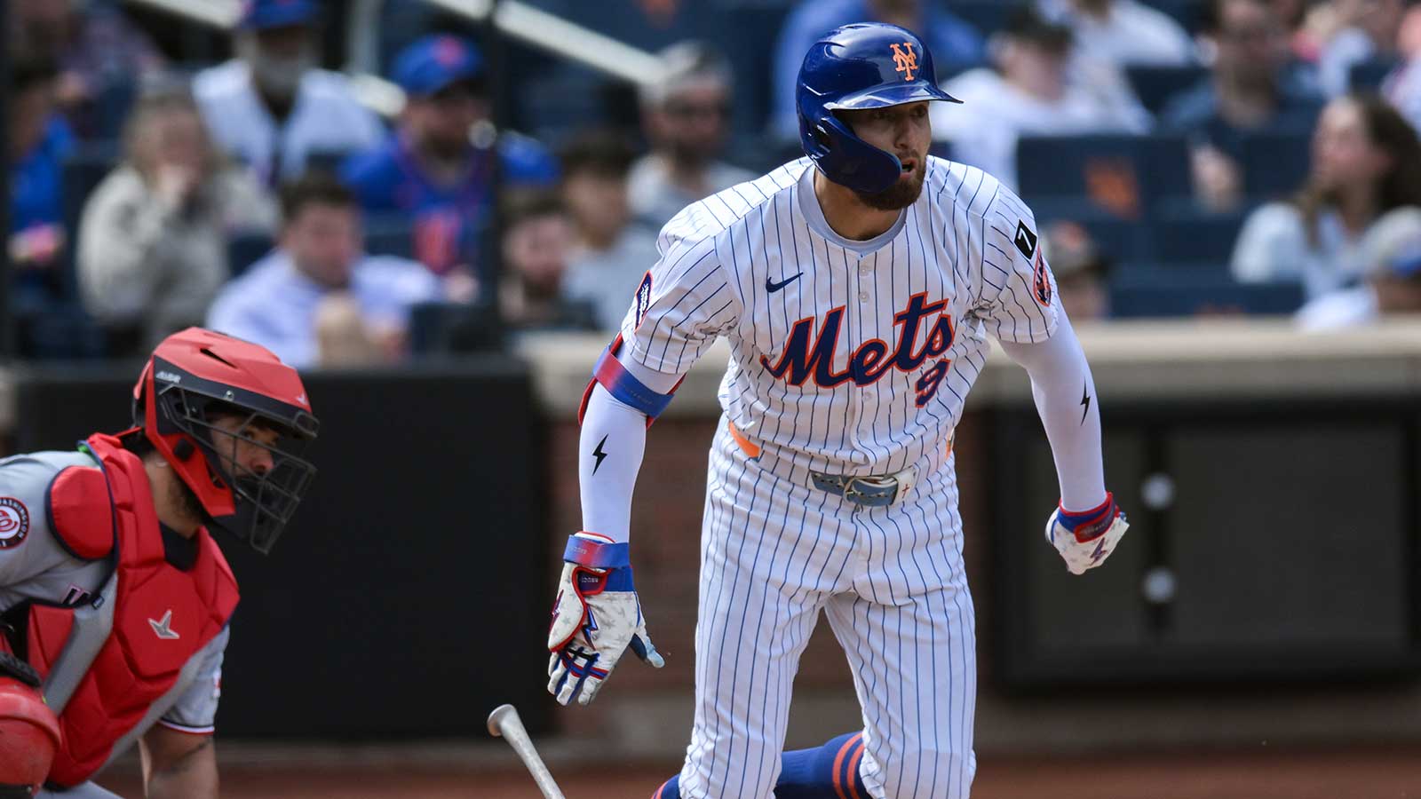New York Mets outfielder Brandon Nimmo (9) hits a single against the Washington Nationals during the first inning at Citi Field.