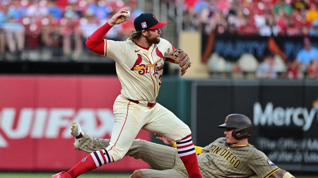 Jul 26, 2025; St. Louis, Missouri, USA; San Diego Padres third baseman Manny Machado (13) is out at second base as St. Louis Cardinals second baseman Brendan Donovan (33) tries in vain for a double play in the fifth inning at Busch Stadium.