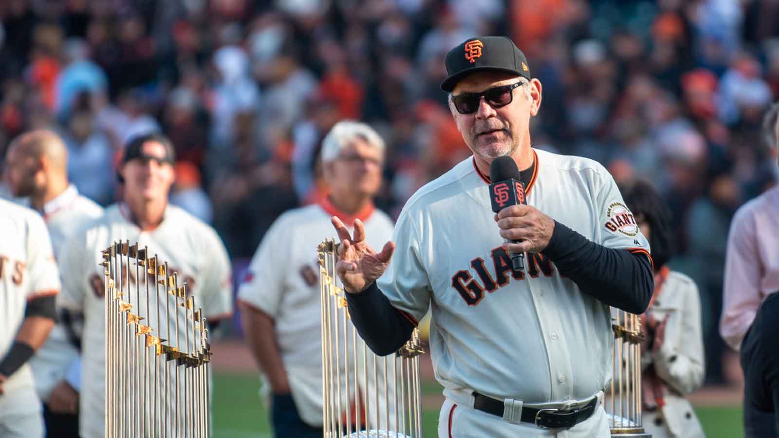 San Francisco Giants manager Bruce Bochy (15) speaks during a tribute to his time as a Giant after the game against the Los Angeles Dodgers at Oracle Park. 