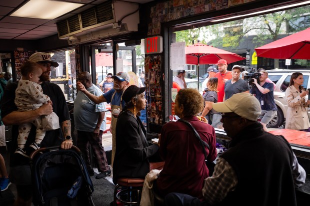 Bears fans and hot dog fans line up at The...