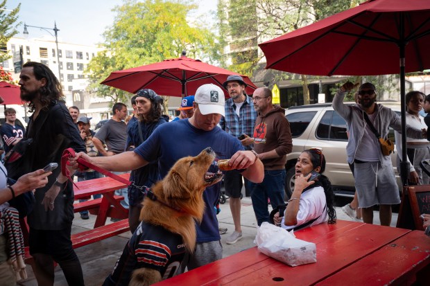 Davin Strouse awards his dog Clark with a free hot...