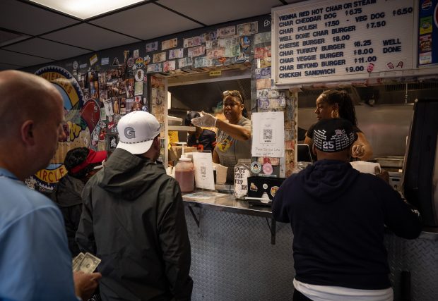 Evelyn Morris, left, and Toni Morris serve up free hot...