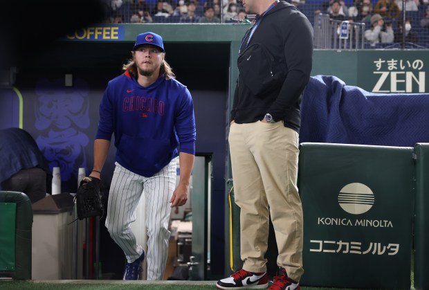 Cubs pitcher Justin Steele enters the field for a team...