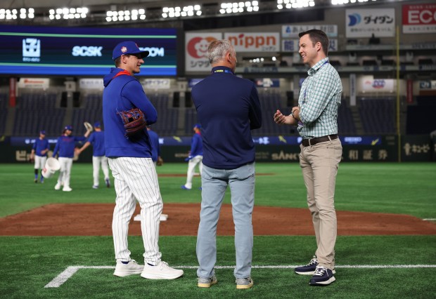 Cubs manager Craig Counsell, from left, President of Baseball Operations...