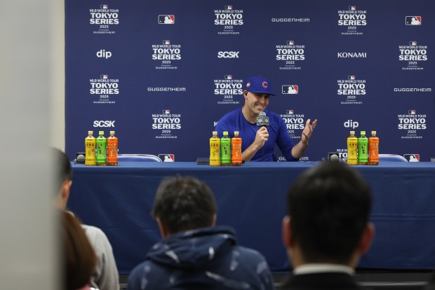 Cubs pitcher Matthew Boyd takes reporters' questions before an exhibition...