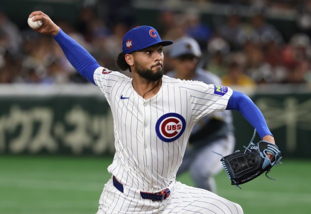 Cubs pitcher Tyson Miller throws against the Hanshin Tigers in...
