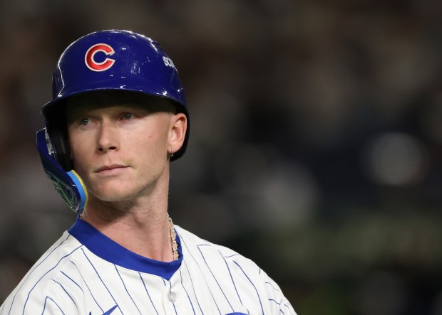 Cubs centerfielder Pete Crow-Armstrong heads to the dugout after flying...