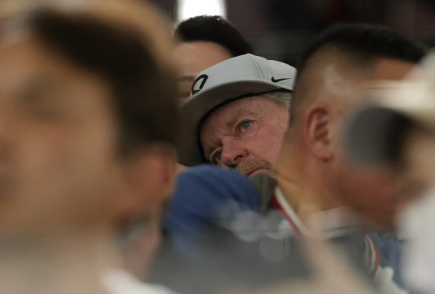 Former Cubs pitcher Rick Sutcliffe watches the seventh inning of...