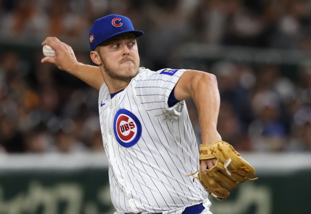 Chicago Cubs pitcher Jameson Taillon throws against the Yomiuri Giants...