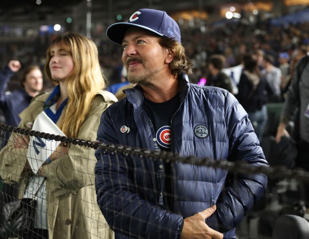 Musician Eddie Vedder takes in the view as the Cubs...