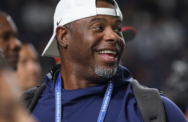 Former MLB player Ken Griffey Jr. watches batting practice for...