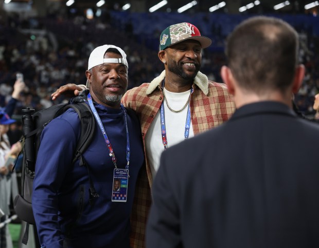 Former MLB players Ken Griffey Jr., left, and CC Sabathia...