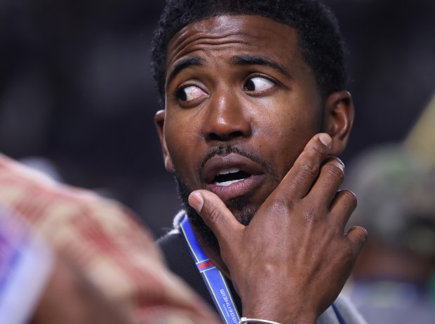 Former Cubs player Dexter Fowler watches batting practice for the...