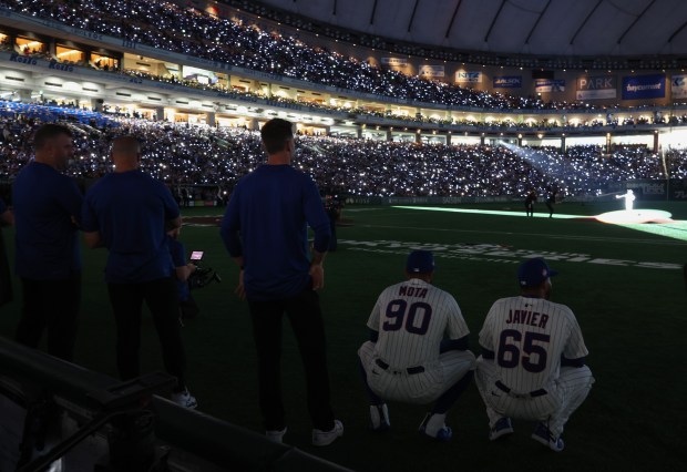 A pregame ceremony takes place before the opening day game...