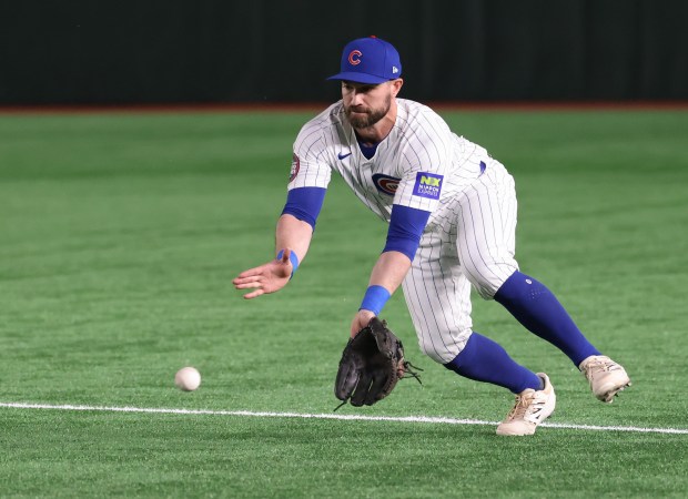 Cubs second baseman Jon Berti fields a grounder from Dodgers...