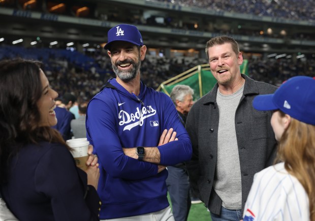 Dodgers pitching coach and former Cubs player Mark Prior, center...