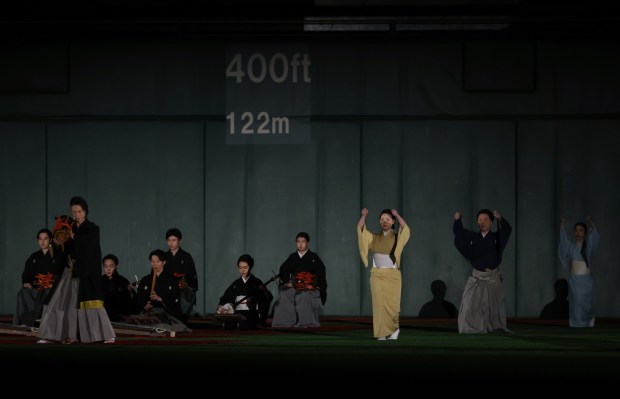 A pregame ceremony takes place in centerfield before a game...